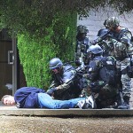 The Santa Clara County SWAT team disarms a 'suspect' during training.