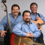 Louis "Moon" Kauakahi on 6-string guitar, John Koko on bass and Jerome Koko on the 12-string. (video)