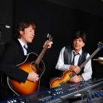 Tony Kishman (Paul McCartney) and Jim Owen (John Lennon) of Twist & Shout.