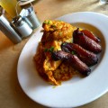 Arroz con pollo with fried plantain.