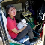 Winifred Thomas and her cat, Toby, began experiencing mysterious ailments soon after a PG&E SmartMeter was installed on their home. (Photo by Felipe Buitrago)