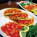 The bacalhau tacos span two cuisines.