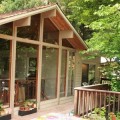 17520 Comanche Trail includes a vaulted, cathedral ceiling in the living room, which leads out to a deck.