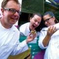 Kipp Berdiansky, Allison Stamm (center)and Devlyn Grech test the latest invention of Project Cupcake.