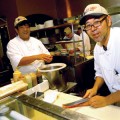 Chefs Noriomi Kaneko (left) and Ichiro Takahashi slice and dice with great skill.