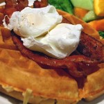Waffles, bacon and poached eggs: Breakfast is served at Flames.