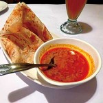 ON THE RISE: Fluffy, Malaysian-style roti prata, slightly sweeter than the Indian original, stands up alongside a dipping sauce with Indian flavors at Mango Garden.
