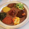 BREAD PLATE: At Walia, vegetable or meat stews called wot are served atop injera bread. Diners tear off pieces of the bread to scoop up bites of wot.