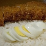 Katsu curry at Muracci’s features a breaded pork cutlet topped with curry sauce (optional egg) and served with rice.
