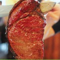 ORDER UP: Gauchos at Taurinus carve meat tableside, allowing customers to pick their favorite cuts in real time.