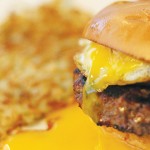 The decadent Hangover Burger comes with bacon, chorizo and a sunny-side-up egg.