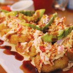 The Guamuchilito, comes with crab, cream cheese and avocado in the center, topped with tampico and more avocado.