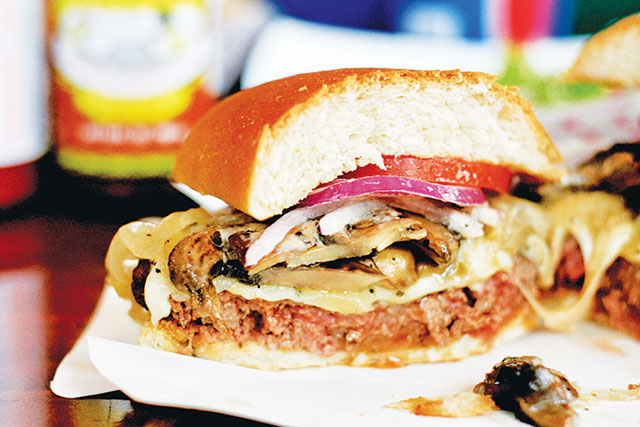 The buttery steak rolls help set Kirks Steakhouse’s burgers apart. Photo by John Dyke 